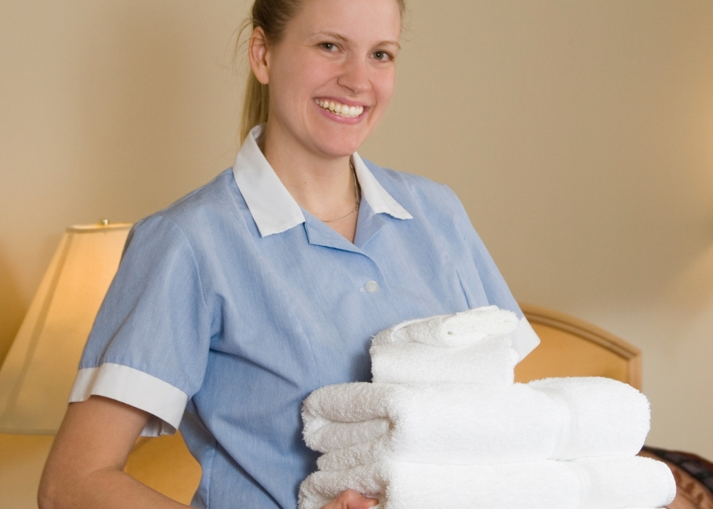 maid with towels